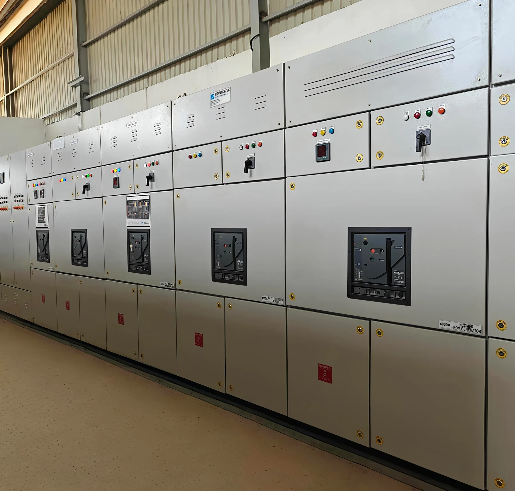 Line-up of Power Control Centre panels manufactured by Mega Switchgears on the shop floor
